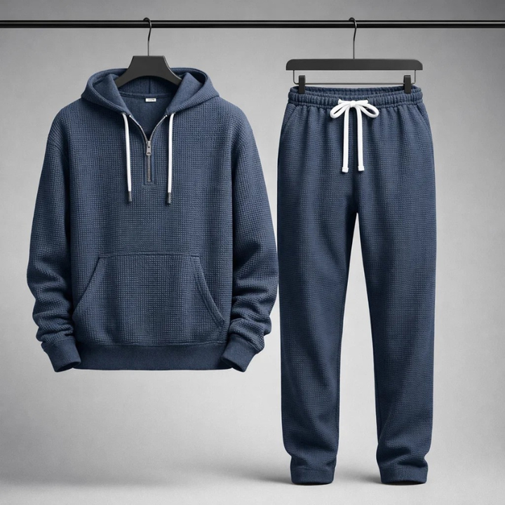 Relaxed Men's Shoreline Comfort Set. Model wearing cozy waffle knit matching set, ideal for leisure.