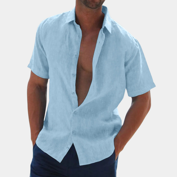 Trendy men's short sleeve casual shirt. Linen button-up for effortless style during spring and summer months.