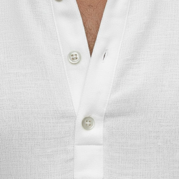 Blue men's short sleeve Henley polo. Comfortable, lightweight, and stylish for summer & casual occasions.