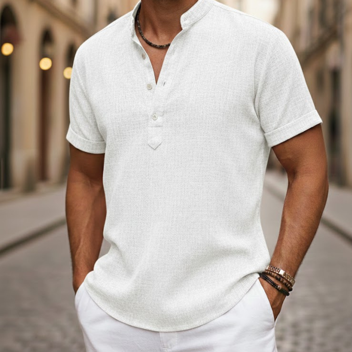 Breathable men's short sleeve Henley polo for ultimate summer comfort. Relaxed fit and versatile style.