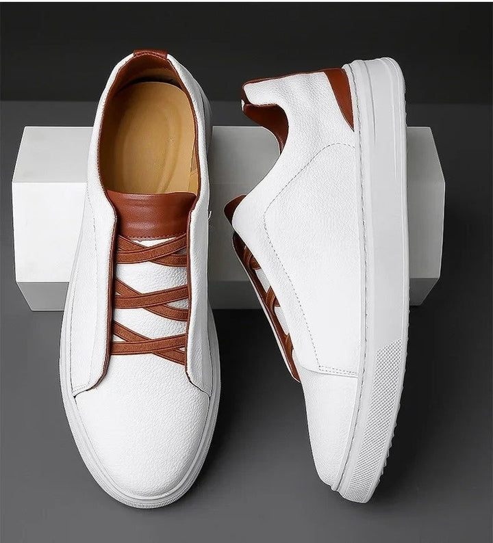 Side view of men's crossover lace fashion sneakers, highlighting durable, water-resistant design.