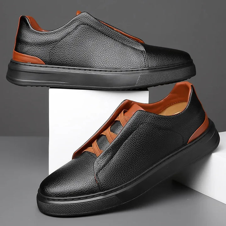 Stain-resistant men's crossover lace lifestyle sneakers, showcasing quality materials & sleek design.