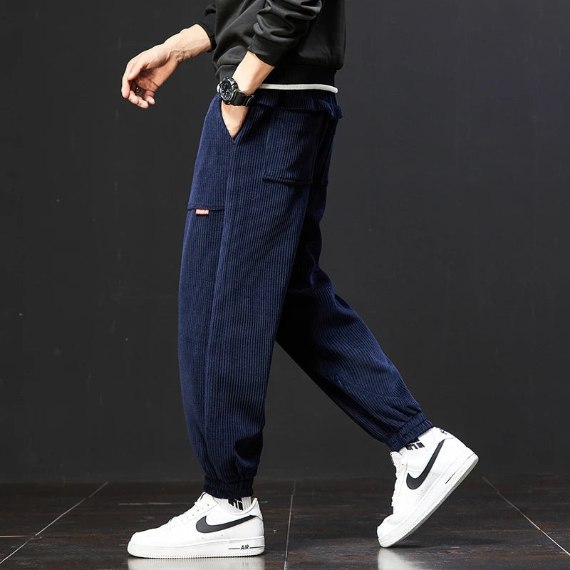 Navy men's Signature Joggers, combining comfort and fashion for a relaxed yet stylish everyday look.