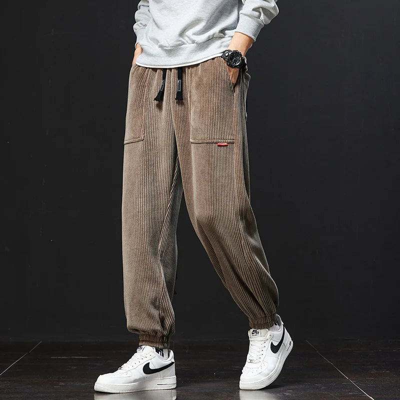 Effortless comfort: men's Signature Joggers, a staple for versatile style and everyday casual wear.