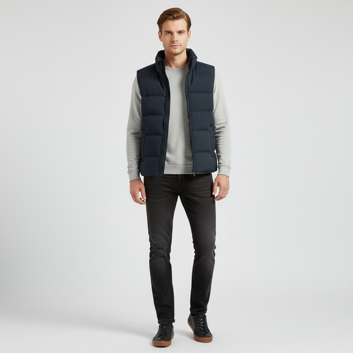 Man wearing a men's insulated puffer vest, Silas model, demonstrating casual fit and warmth