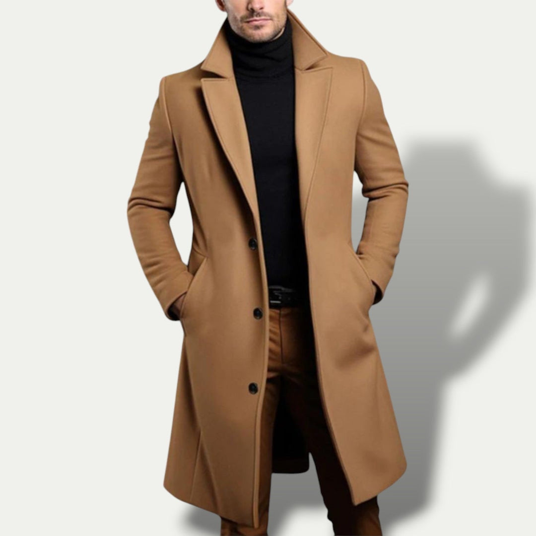 Refined men's single-breasted long coat. Tailored trench outerwear, perfect for smart all-season men's fashion.