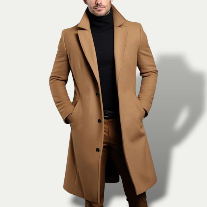 Refined men's single-breasted long coat. Tailored trench outerwear, perfect for smart all-season men's fashion.