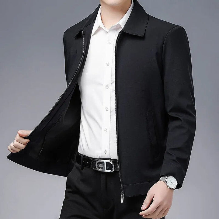 Stylish navy men's bomber jacket, perfect for fall fashion and versatile everyday comfort.