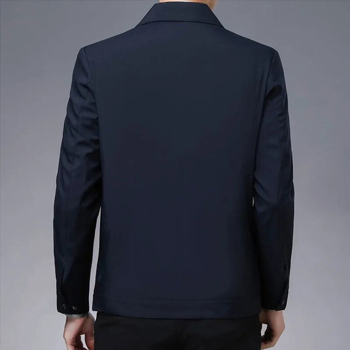 Modern black bomber jacket for men, offering sleek design and ideal for spring casual wear.