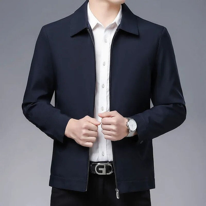 Versatile navy men's bomber jacket, excellent for casual outfits and comfortable everyday wear.