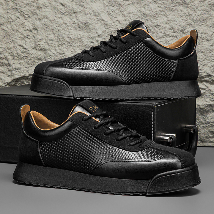 Black men's casual sneakers, sleek & comfortable for everyday urban adventures.