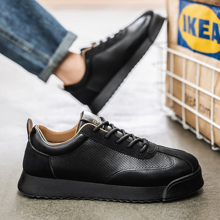 Stylish black men's sleek sneakers, modern casual footwear for everyday comfort.
