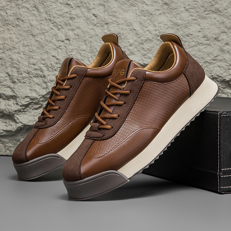 Brown men's sleek casual sneakers, perfect for everyday stylish urban comfort.