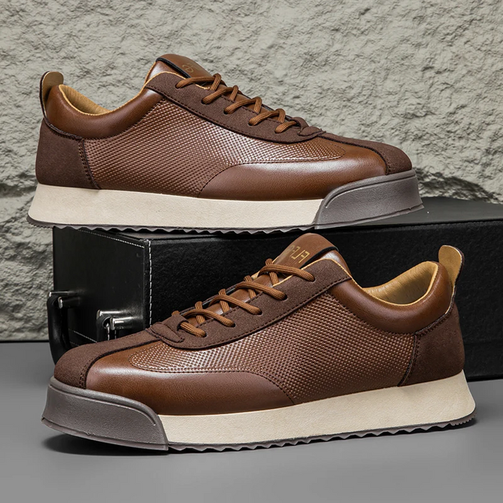 Stylish men's modern black casual sneakers, comfortable everyday urban footwear.