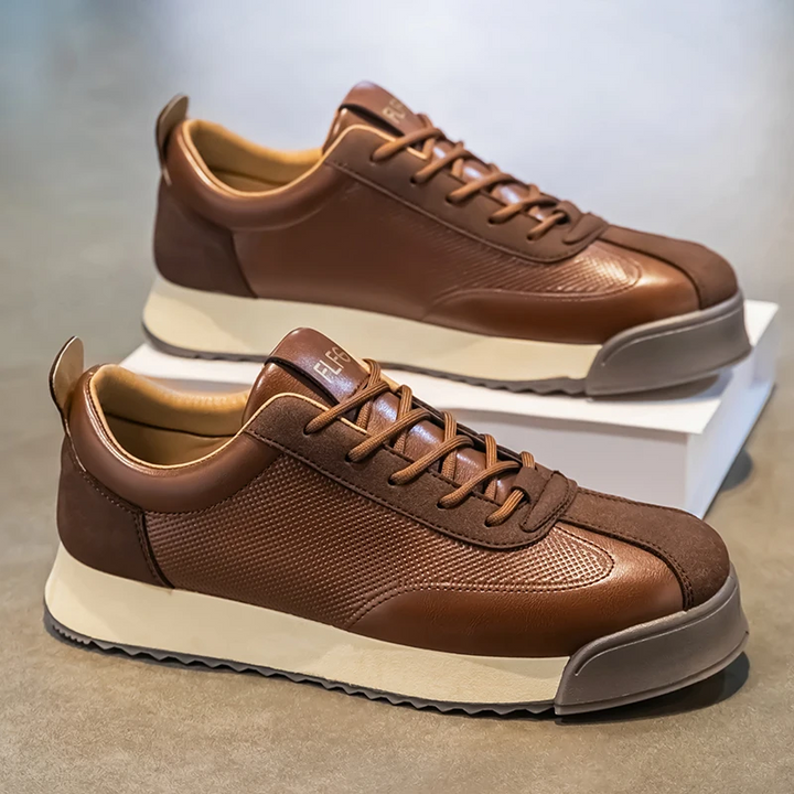 Comfortable men's everyday brown sneakers, sleek casual urban footwear for modern style.