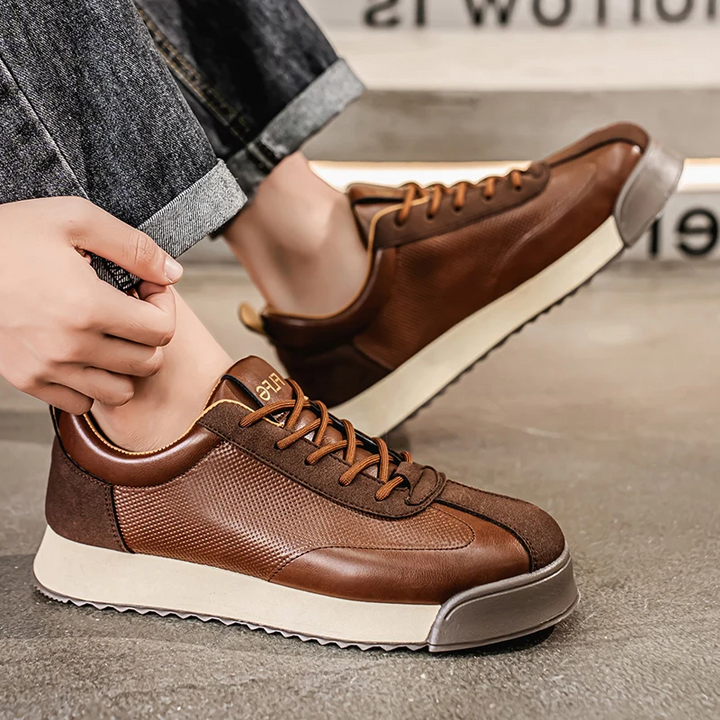 Sleek men's modern casual sneakers in brown, comfortable urban footwear for everyday style.