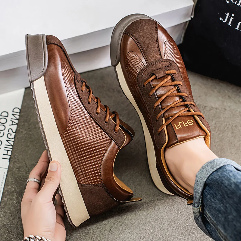 Versatile men's casual brown sneakers, sleek modern footwear for everyday comfort & style.