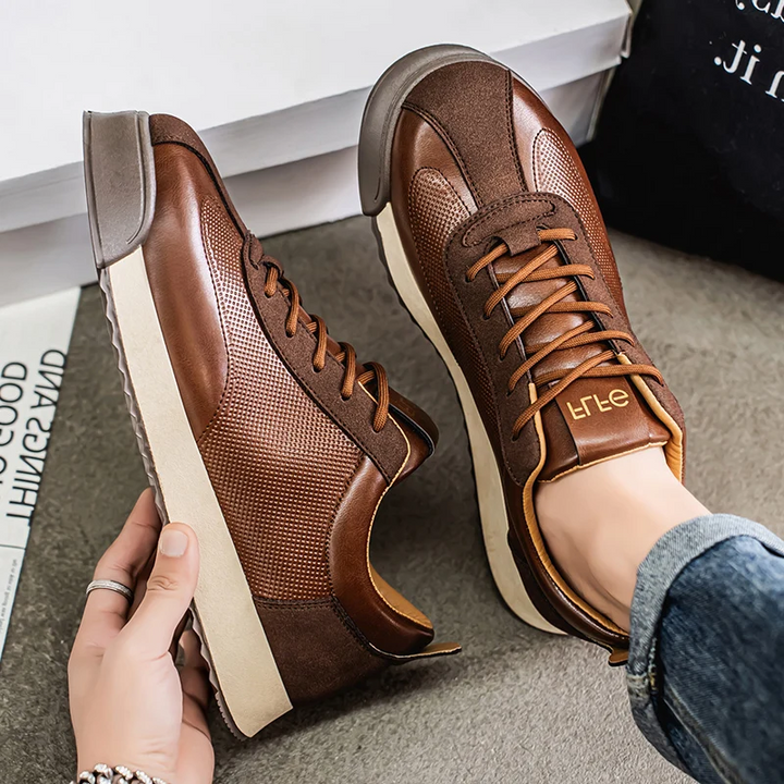 Versatile men's casual brown sneakers, sleek modern footwear for everyday comfort & style.