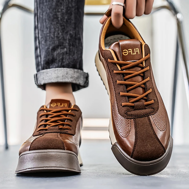 Men's sleek casual black sneakers, comfortable everyday urban footwear for stylish men.