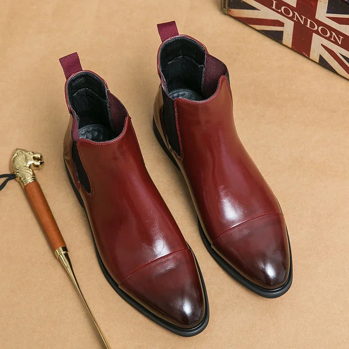 Modern men's slip-on boots with a sleek, minimalist design, ensuring comfort and easy styling.