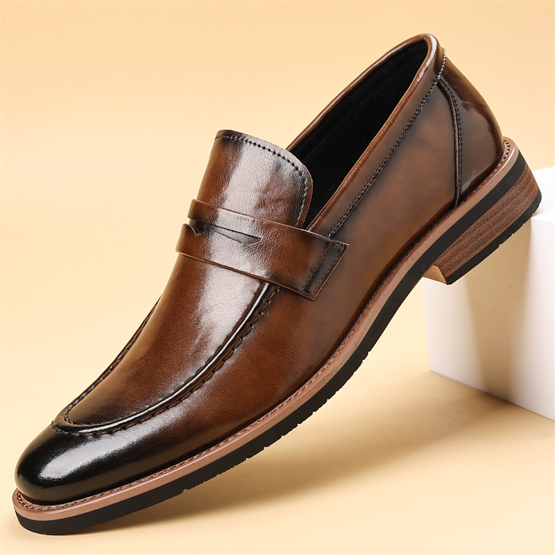 Men's sleek brown leather penny loafers, comfortable slip-on shoes for everyday style and casual wear.