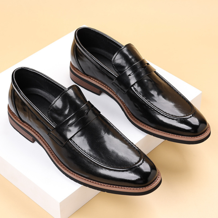 Modern men's brown penny loafers, easy slip-on style for ultimate comfort and everyday elegant footwear.