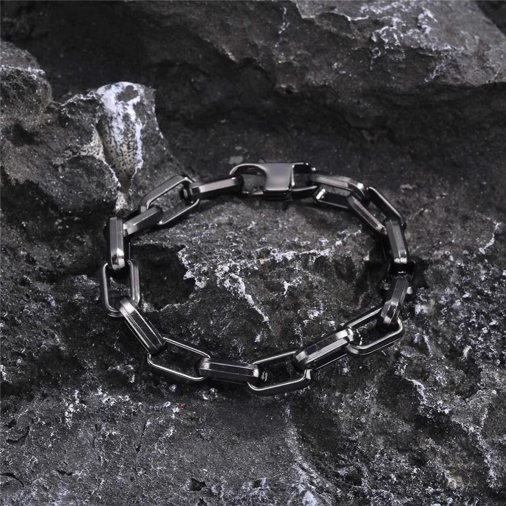Luxury men's sleek chain link bracelet. Non-tarnishing gold-tone, a durable and stylish statement accessory.