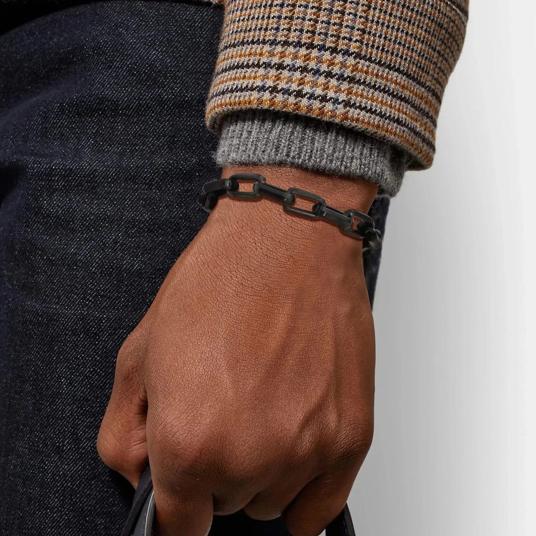 Durable men's black chain link bracelet. Sleek, non-tarnishing design; a versatile and stylish accessory.