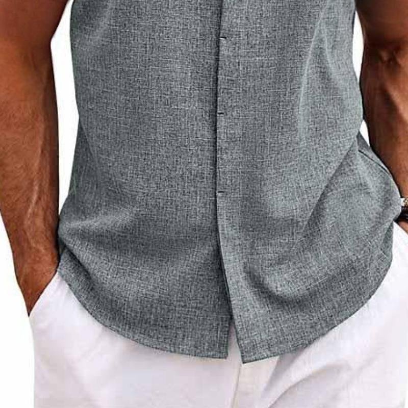 Men's casual sleeveless button-down shirt. Relaxed fit tank top ideal for summer, beach, outdoor, or vacation wear.