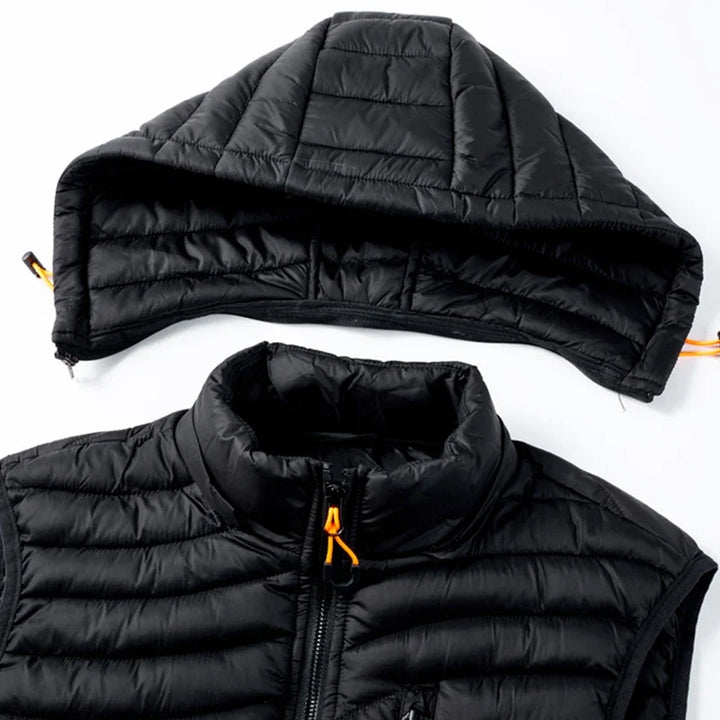 Classic men's sleeveless puffer vest with a detachable hood, excellent cold weather gear.