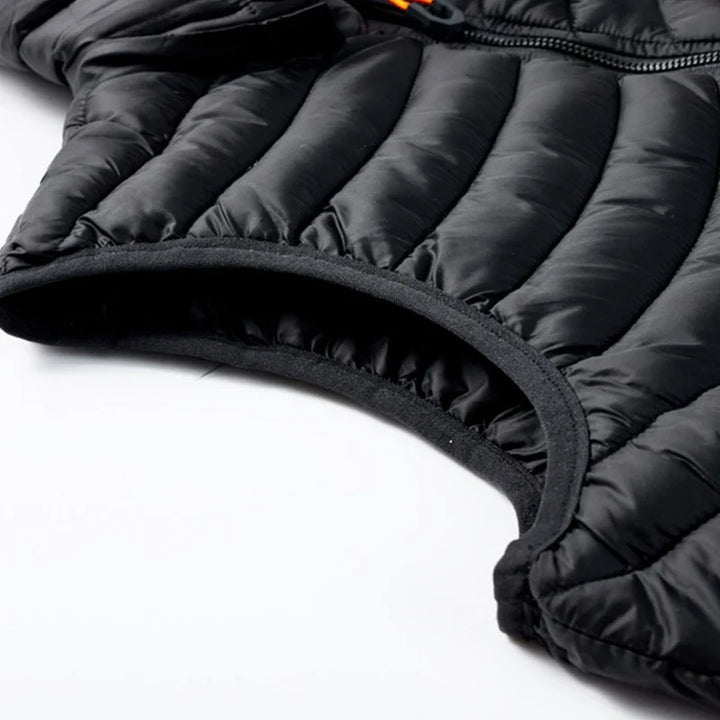 Comfortable men's fashion puffer vest, sleeveless design offers warmth without bulk in cold.