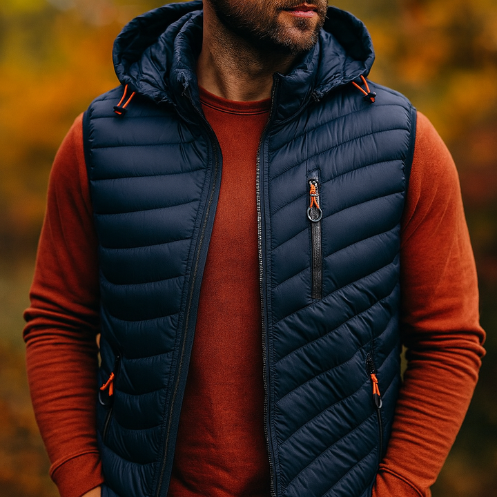 Men's puffer vest with detachable hood & zip pockets, perfect for cold weather and layering.