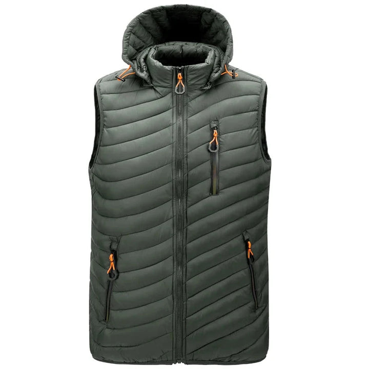 Lightweight men's travel puffer vest, sleeveless and water-resistant, ideal for cold climates.
