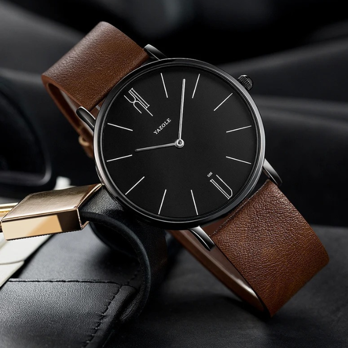 Slim men's watch, genuine cowhide leather strap, simple clean dial. Elegant accessory.