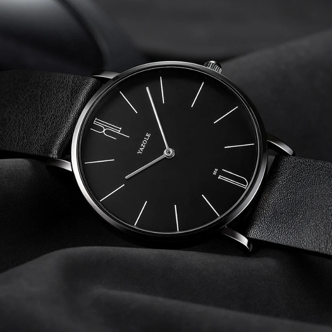 Classic men's timepiece. Slim cowhide leather watch with a sleek, clean, easy-to-read face.