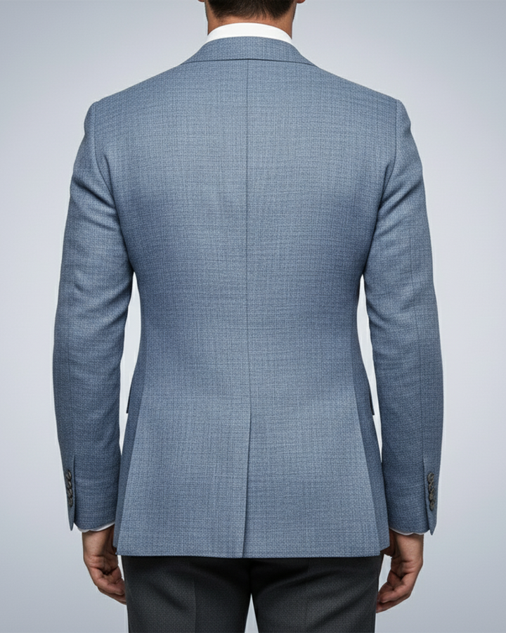 Men's slim fit blue blazer. Essential men's apparel for a tailored, sharp look on any occasion, from business to casual.