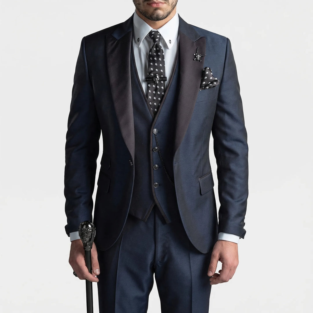 Man wearing a sharp burgundy slim-fit 3-piece suit, perfect for a wedding or business event.