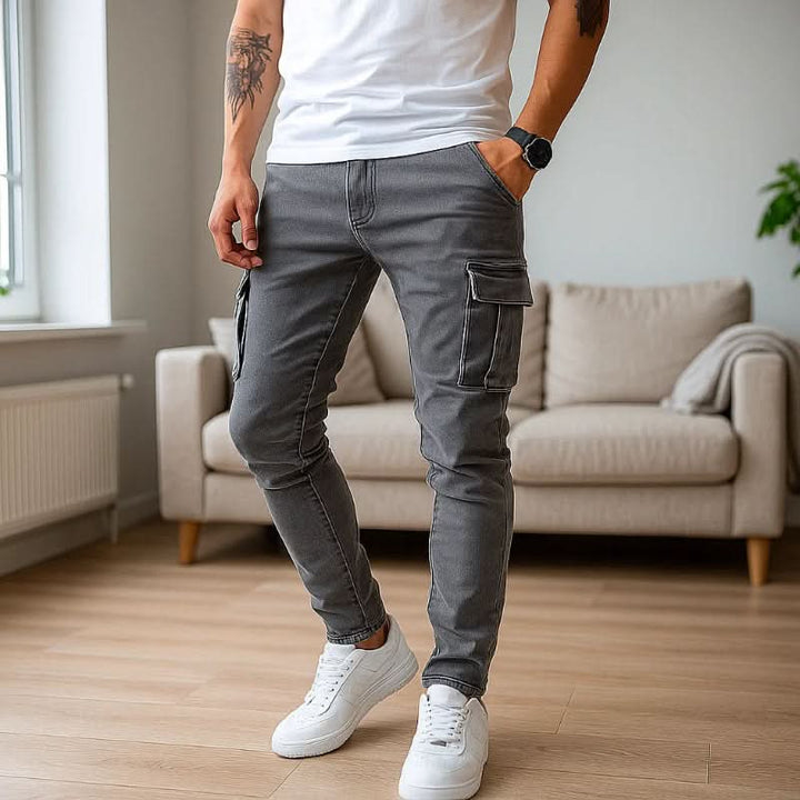 Stylish multi-pocket men's slim fit cargo jeans, practical & versatile for casual wear.