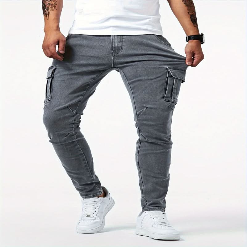Fashionable men's slim fit cargo jeans with practical pockets, enhancing any street outfit.