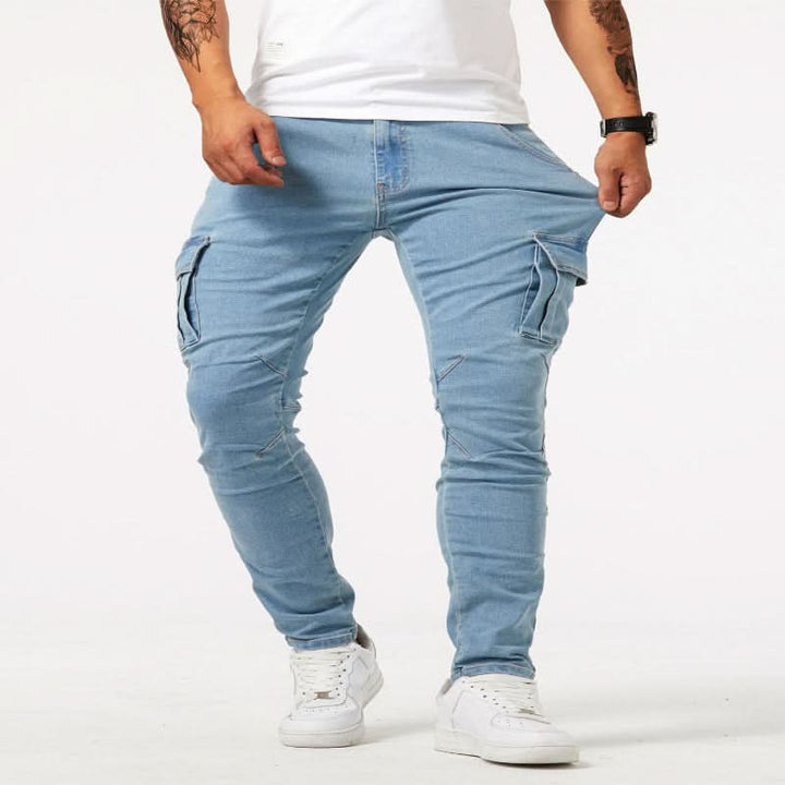 Close-up of side pocket detail on men's slim fit cargo jeans, showing craftsmanship.
