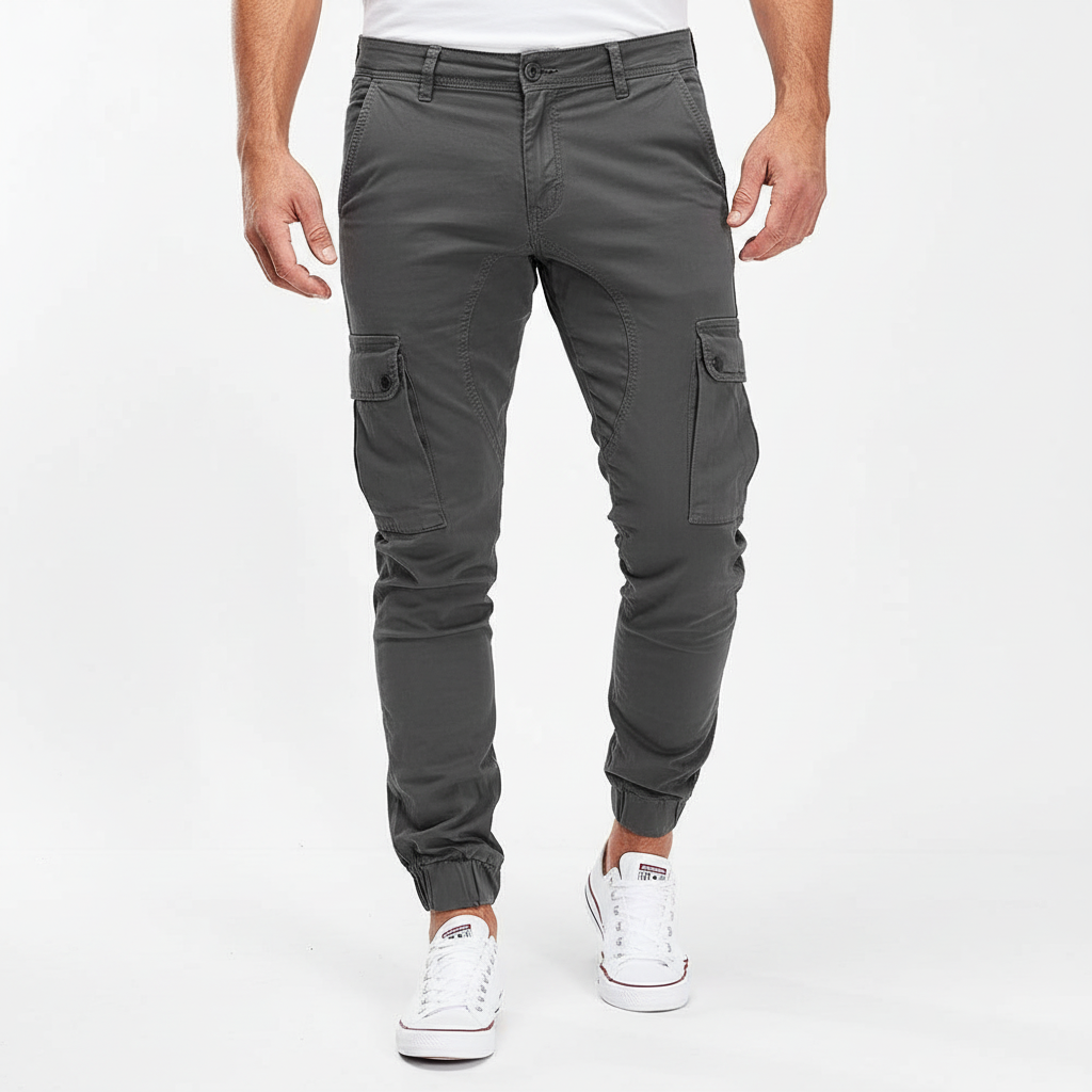 Man wearing slim fit cargo pants, Andreas design, demonstrating comfortable fit and movement.