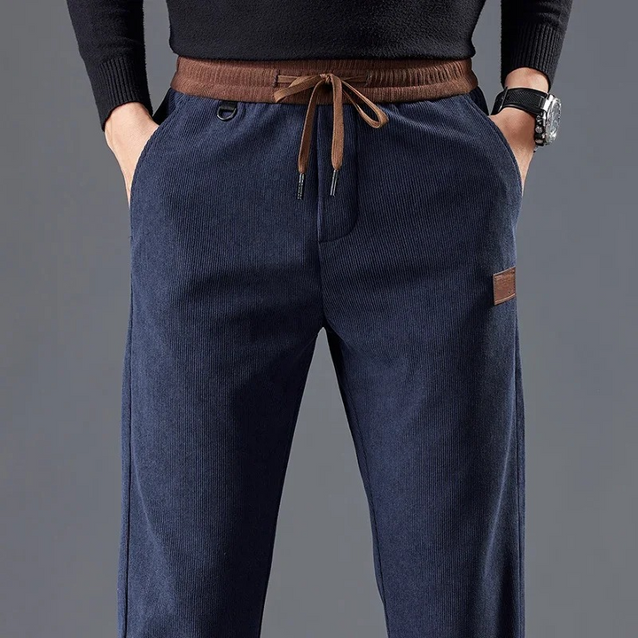 Comfortable men's slim fit casual pants, wrinkle-resistant & versatile for modern fashion.