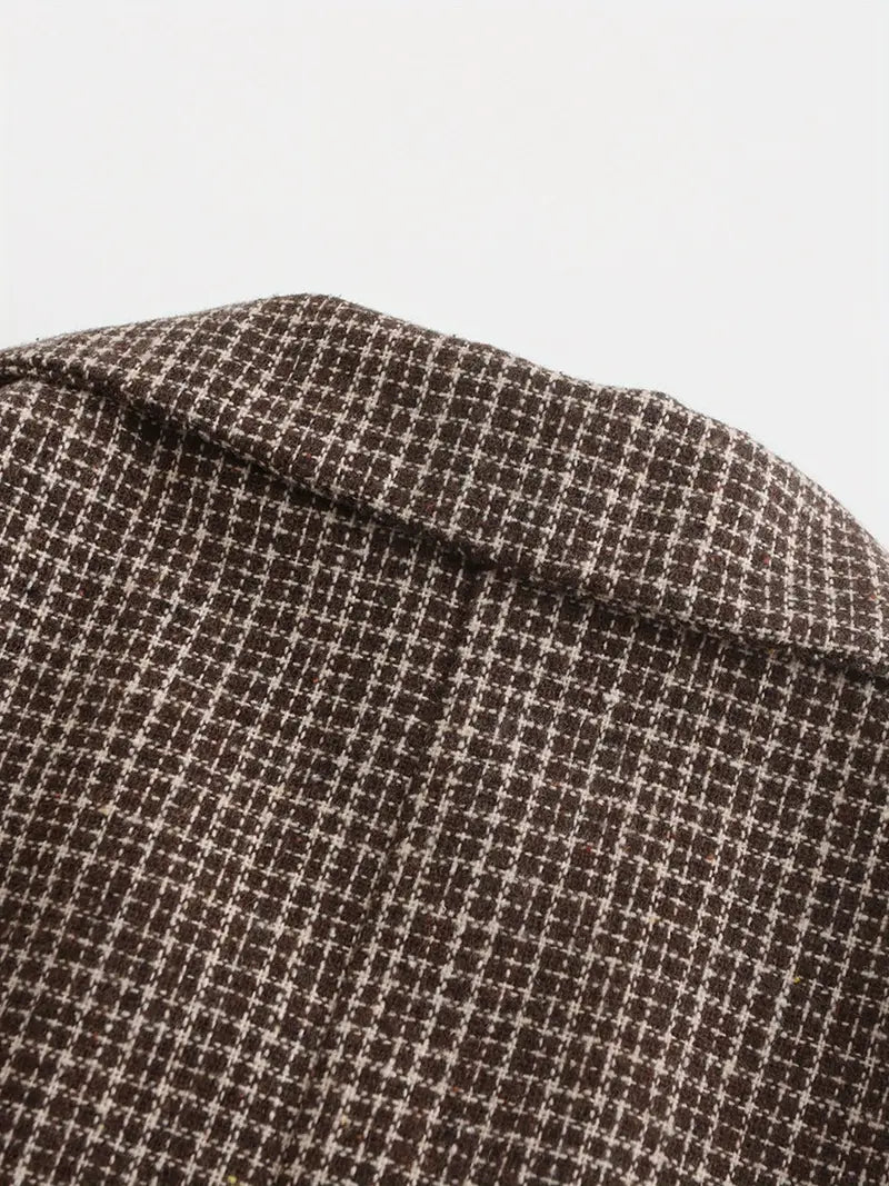 Sophisticated men's check blazer, slim fit, versatile for formal and smart casual events and business wear.