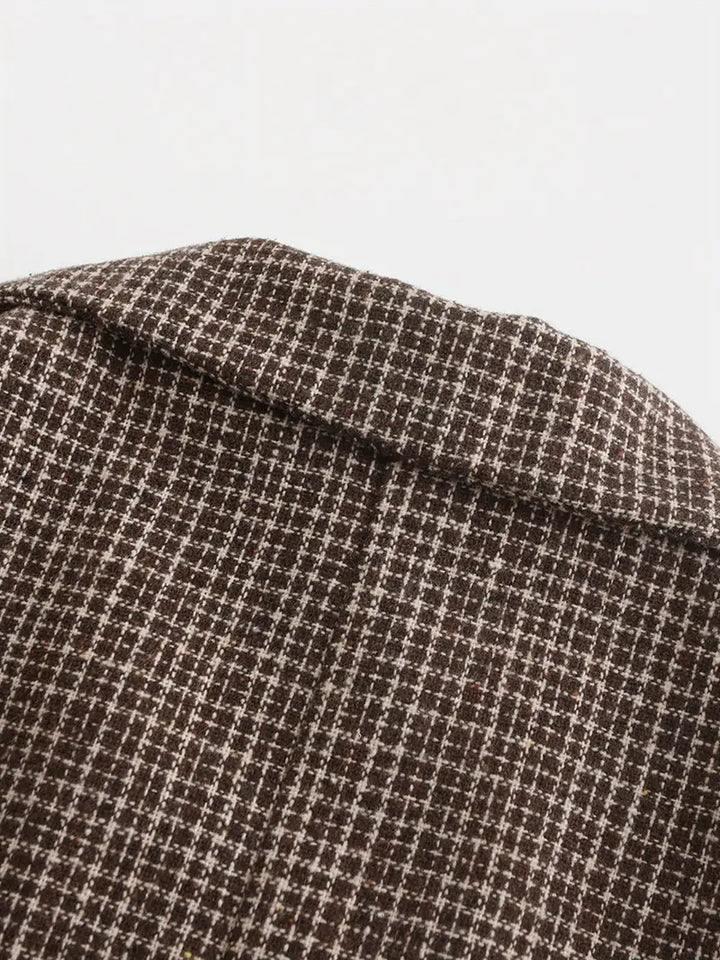 Sophisticated men's check blazer, slim fit, versatile for formal and smart casual events and business wear.