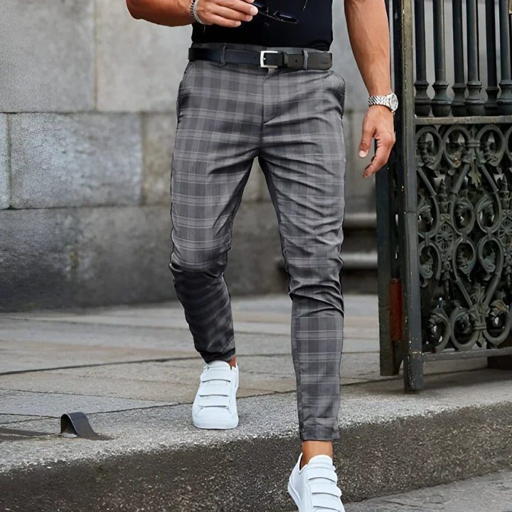 Modern men's cropped checked pants, slim fit, offering a sharp and fashionable look.