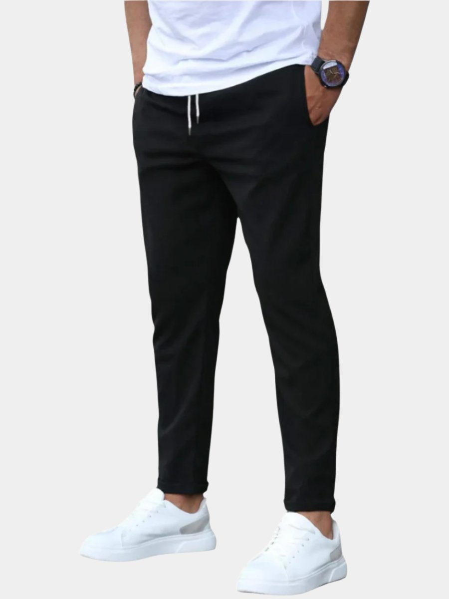 Men's slim fit drawstring chino pants for flexible comfort and modern style.