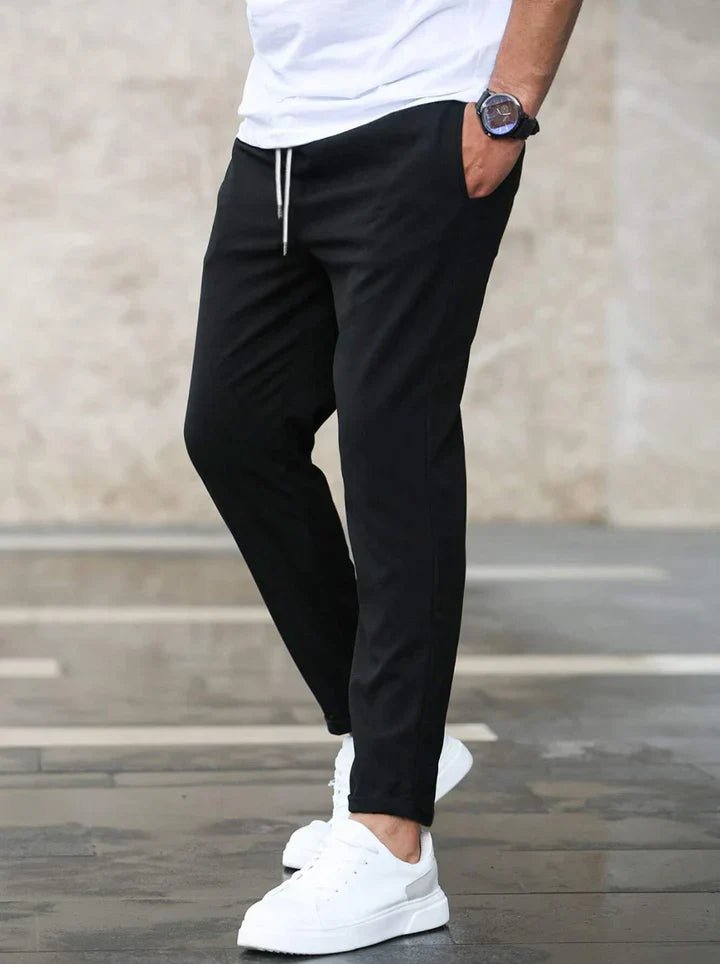 Flexible men's drawstring chino pants, a comfortable and stylish choice for any casual occasion.