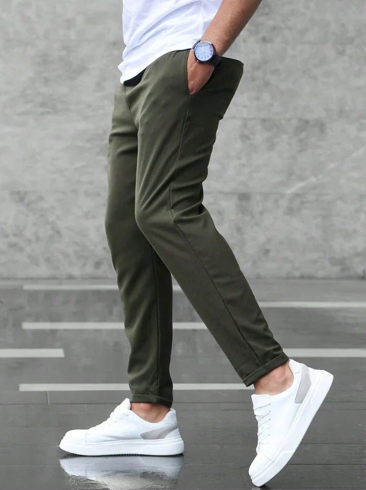 Slim fit men's drawstring chino pants, offering flexible comfort and a modern, versatile look.