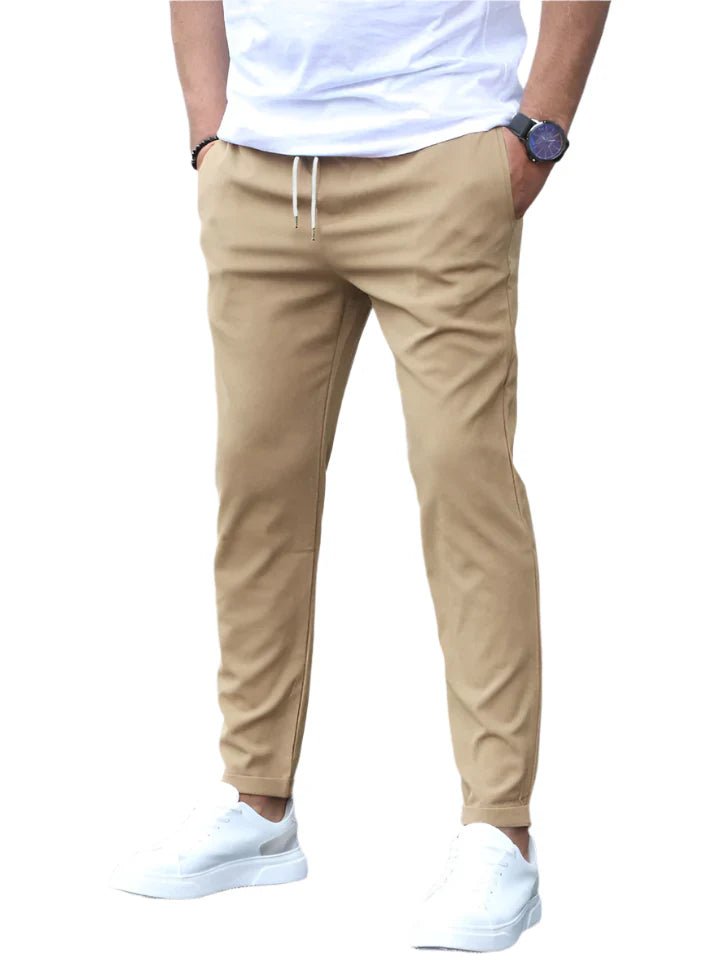 Flexible men's drawstring chino pants in a slim fit, ideal for all-day comfortable wear.