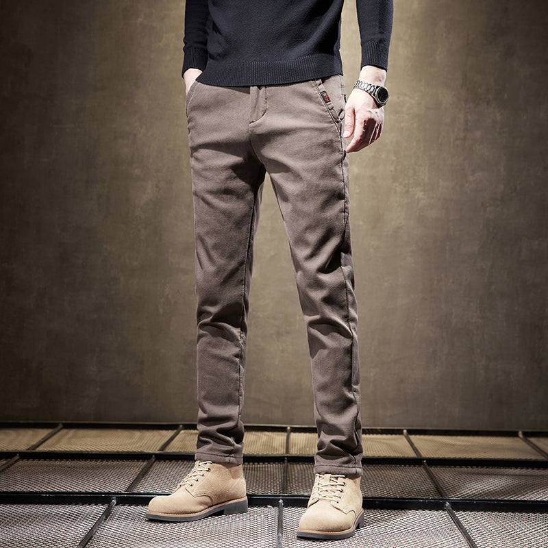 Close-up of fabric: Wrinkle-resistant men's slim fit pants, offering stretch comfort for everyday wear.